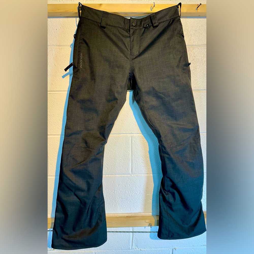Volcom men’s Tight Series snow pants, black, 8k waterproof, sleek design.